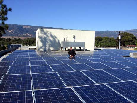 William McMullen on the BIOPAC roof in a sea of solar panels
